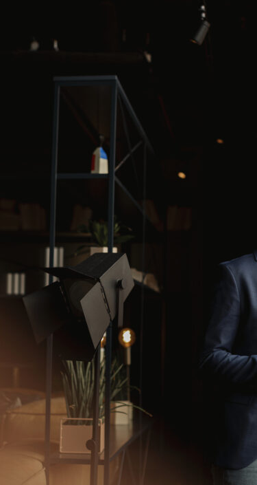 Businessman in cafe holding digital tablet